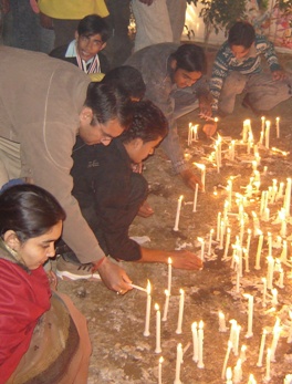 Lighting Candles at the Jesus Exhibition